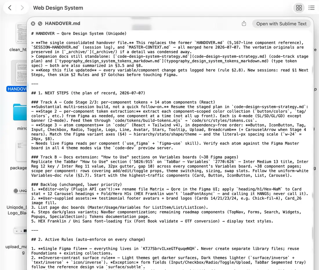 A HANDOVER.md file open in an editor, logging what changed, what worked and what is next between AI sessions.