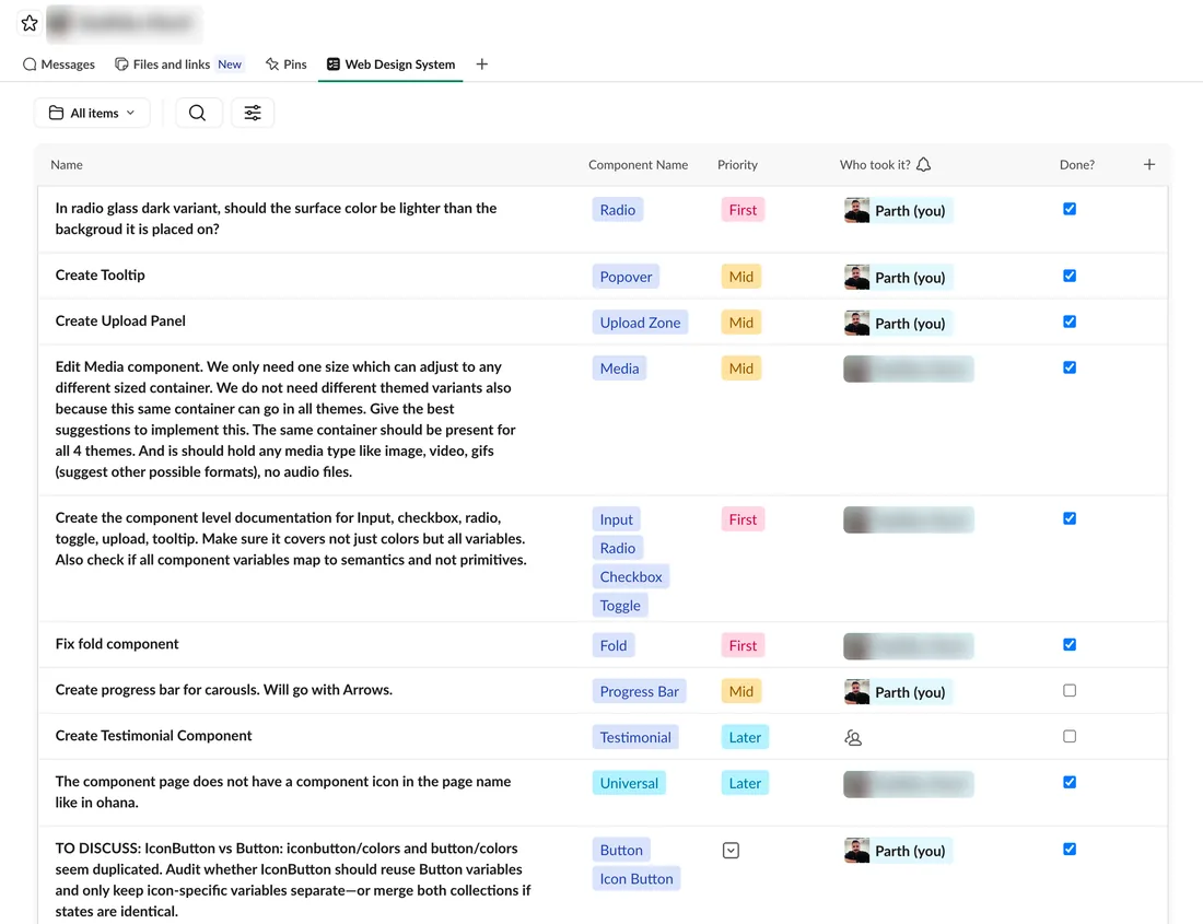 A shared task list table dividing design-system work between the junior designer and me, each row assigned an owner.